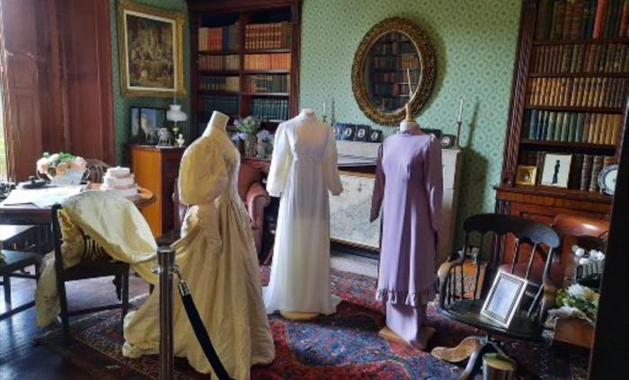 Display of period costume in the library at Scolton Manor